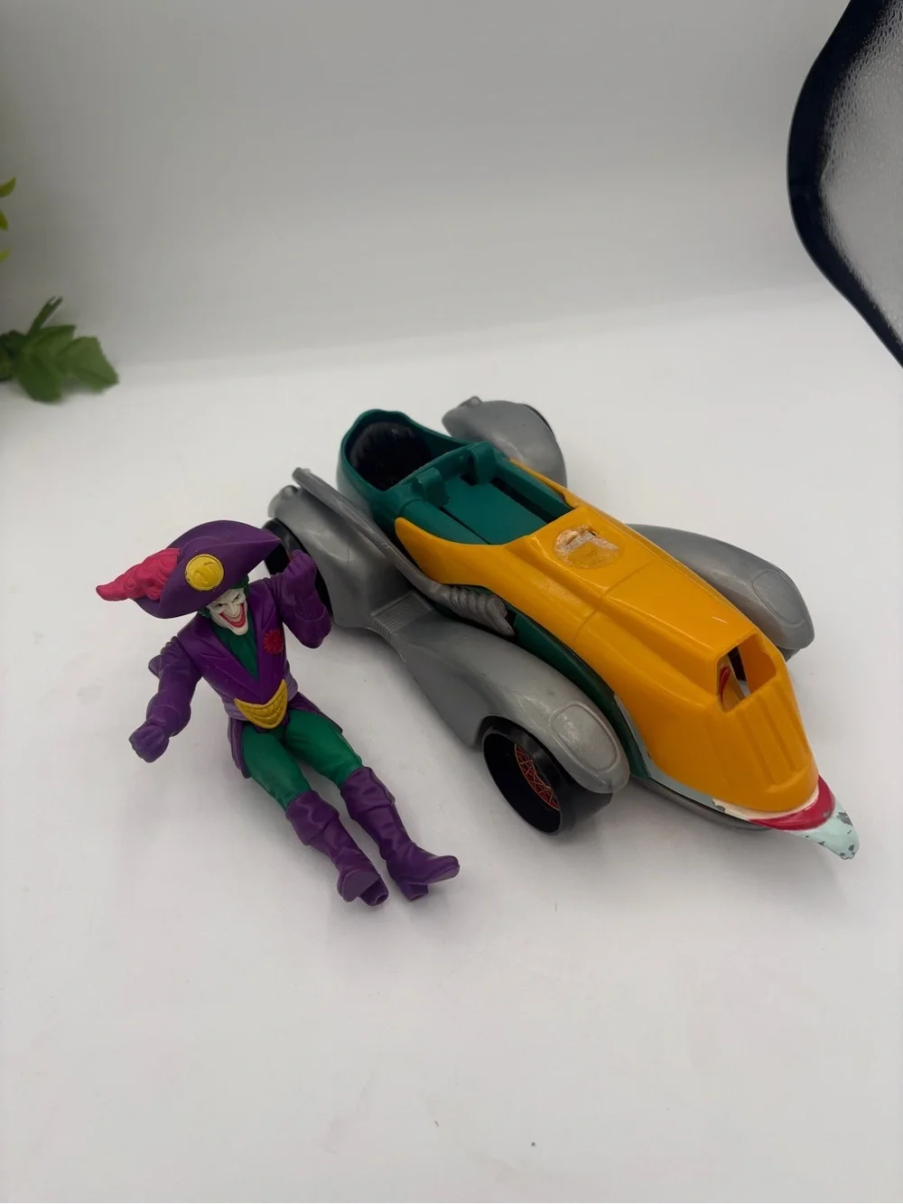 Purple & Yellow Joker Action Figure with Yellow-Green Batmobile Toy